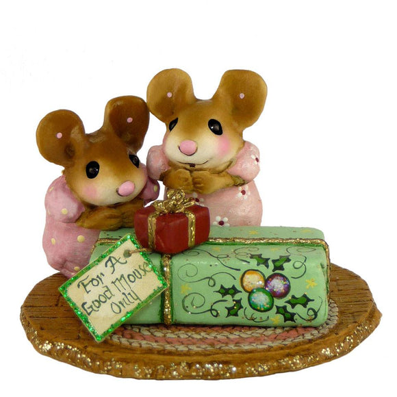 Mice Excited to Open Their Christmas Present 